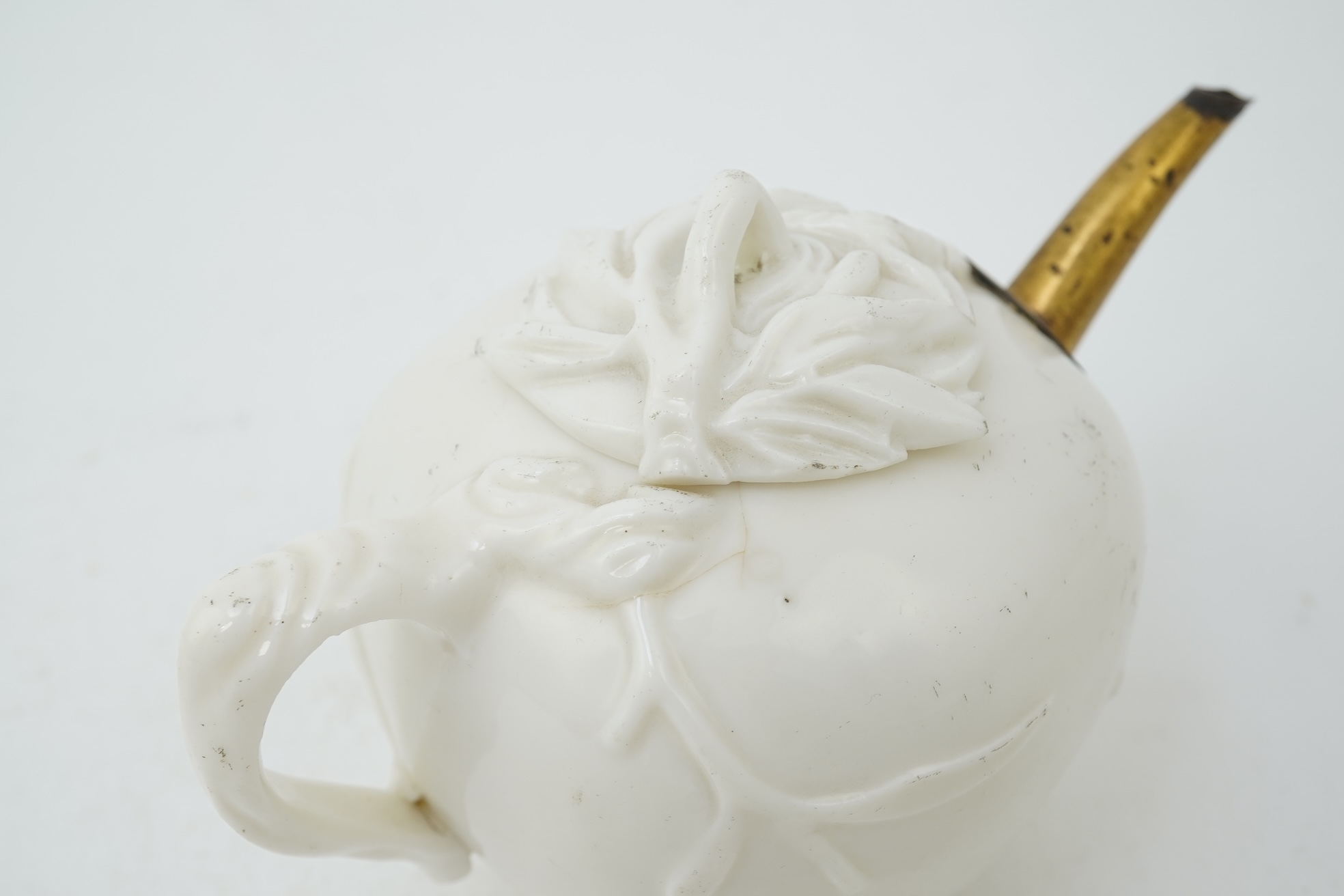 A Chinese Dehua blanc-de-chine ‘pomegranate’ teapot, mid 17th century